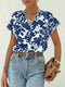 Blusa floral con cuello en V