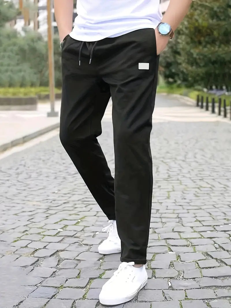 Fashionable, sporty stretch jogging pants with drawstring and relaxed waist