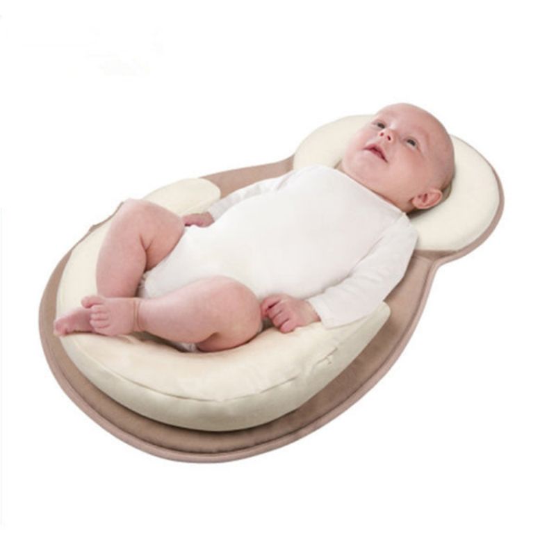 Tragbares Babykopfkissen für das Bett