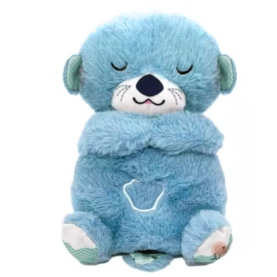 Juguete de peluche con música relajante y movimiento de respiración.
