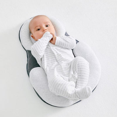 Tragbares Babykopfkissen für das Bett