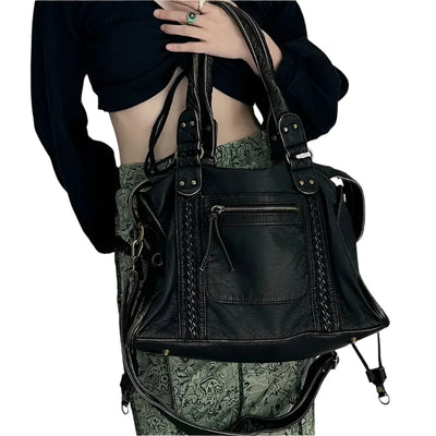 Bolso de hombro estructurado para mujer con acabado lavado y compartimentos.