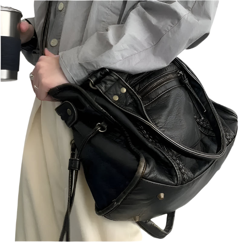 Bolso de hombro estructurado para mujer con acabado lavado y compartimentos.