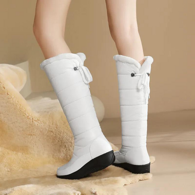 Botas de invierno para mujer con forro de piel: hasta la rodilla y cálidas para los días de nieve.