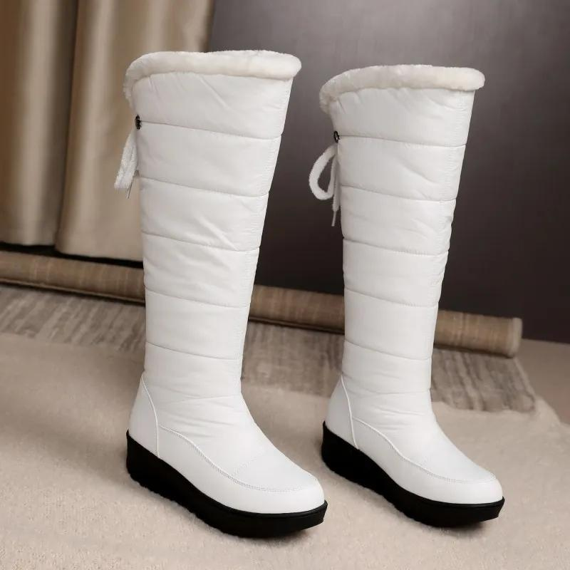 Botas de invierno para mujer con forro de piel: hasta la rodilla y cálidas para los días de nieve.