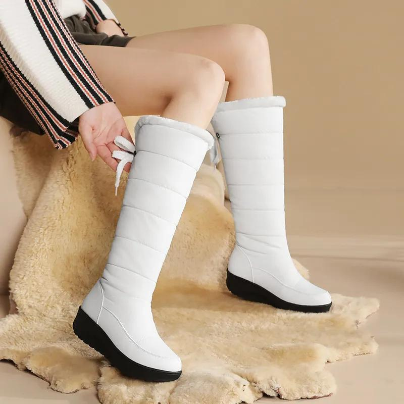 Botas de invierno para mujer con forro de piel: hasta la rodilla y cálidas para los días de nieve.