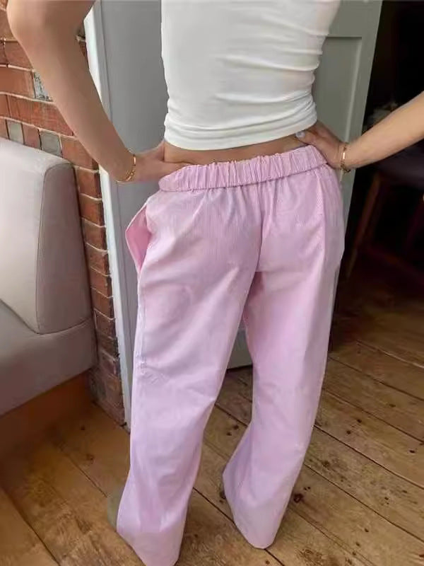 Gabrielle - Pantaloni a gamba larga con righe verticali