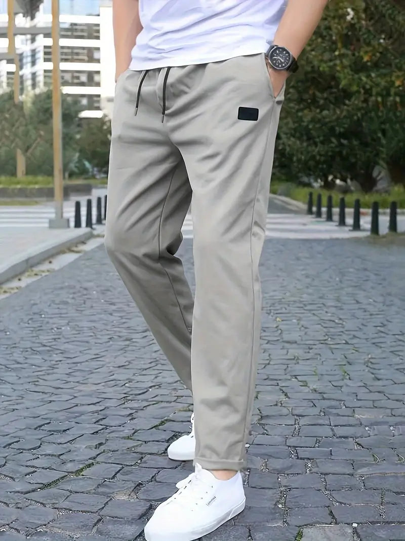 Fashionable, sporty stretch jogging pants with drawstring and relaxed waist