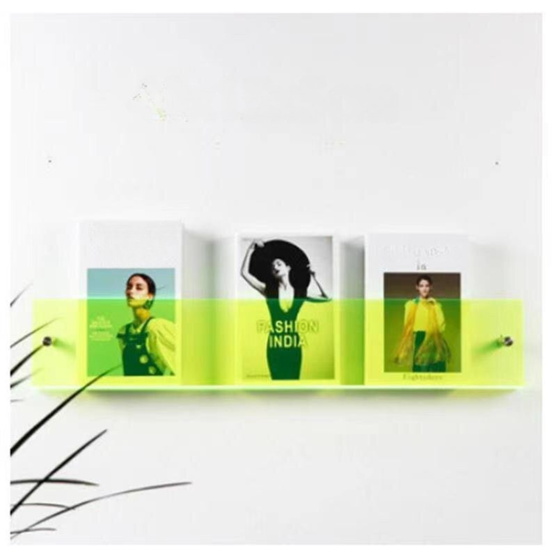 Revistero de pared fabricado en acrílico transparente