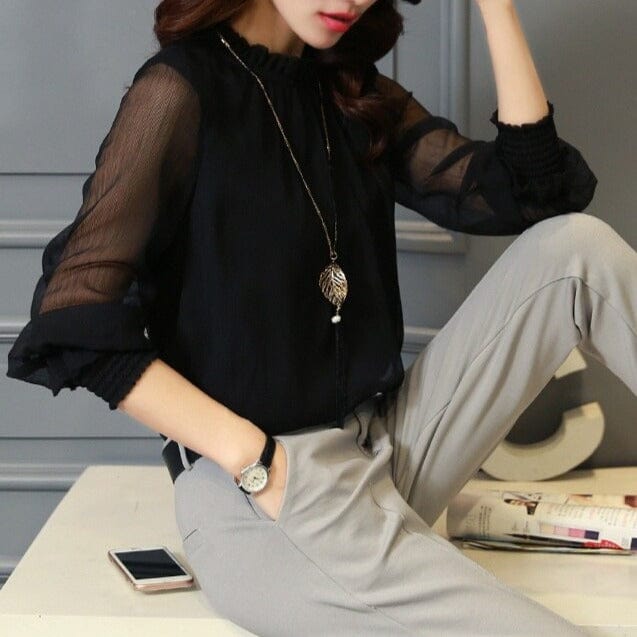 Camisa con volantes y mangas transparentes