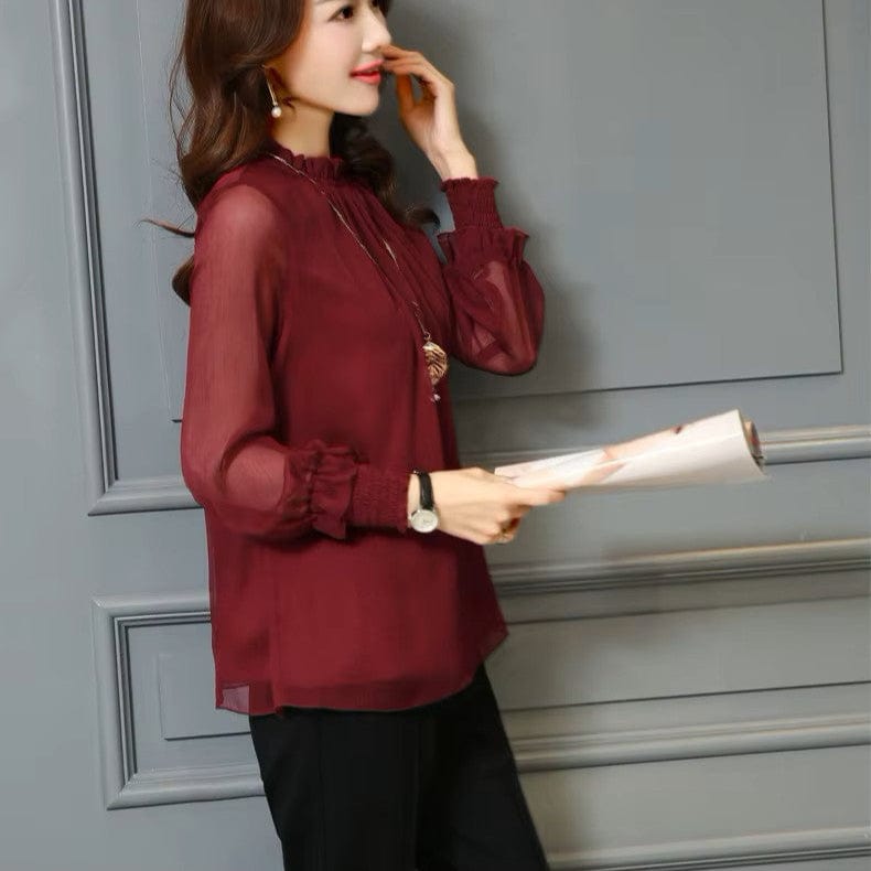 Camisa con volantes y mangas transparentes